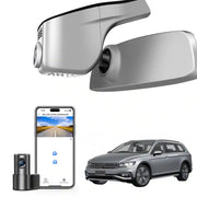 Car mirror with camera, smartphone displaying app interface, and car 