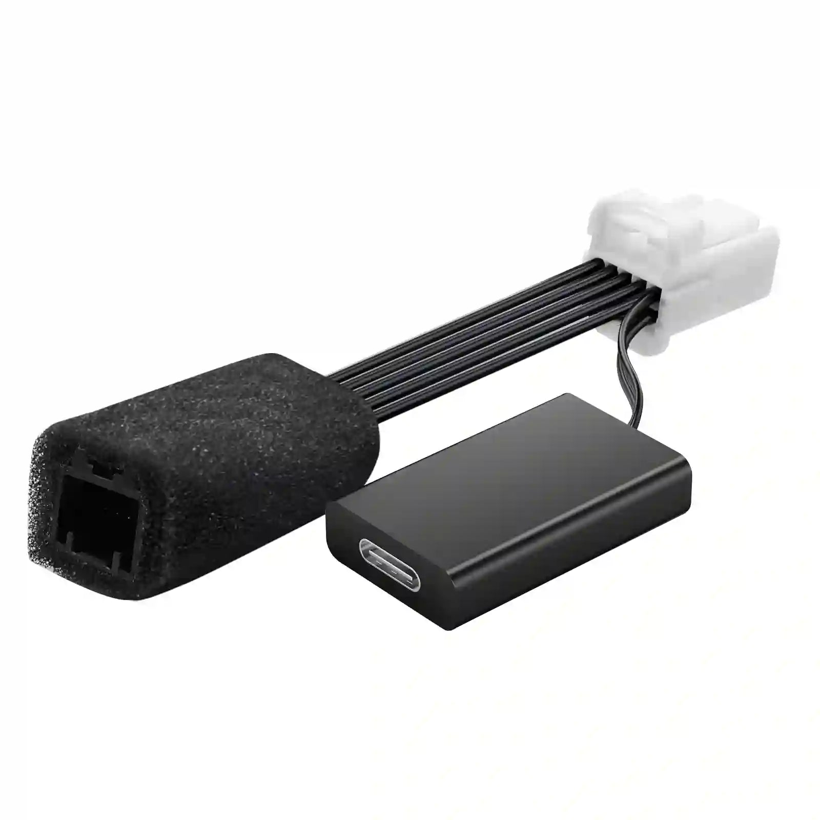 Computer hardware components including a black connector and a rectangular black device on a white background