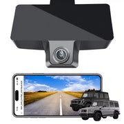 Car rearview camera with smartphone displaying road view and vehicle illustration on a white background