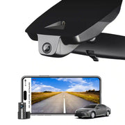 Car camera system with smartphone displaying road view and car in the background dual camera 