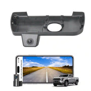 Car backup camera system with smartphone app displaying a road scene.