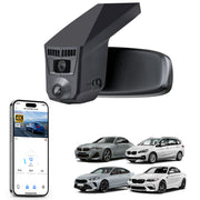 Car rearview mirror built-in dash cam with smartphone app control, 4K Ultra HD recording, GPS tracking, and BMW 2 Series M2 models in the background.