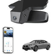 Mangoal rearview mirror built-in dash cam with smartphone app control, 4K Ultra HD recording, GPS tracking, and BMW 2 Series M2 models in the background.
