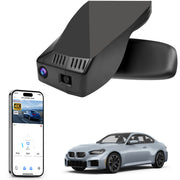 Mangoal rearview mirror built-in dash cam with smartphone app control, 4K Ultra HD recording, GPS tracking, and BMW 2 Series M2 models in the background.